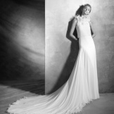 Wedding dress with volumetric elements