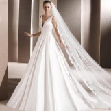 La Sposa Deep Neckline Wedding Dress
