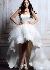 Short puffy wedding dress with a long train