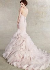 A magnificent mermaid wedding dress with a train