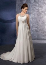 Empire style wedding dress with straps around the neck.