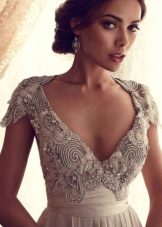 Empire wedding dress with a stone embroidered bodice