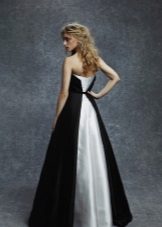 Black evening dress with a white train