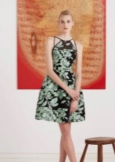 Black evening dress with a green print