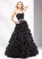 Black evening dress with flowers on a skirt