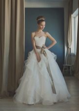 A magnificent wedding dress with draping on a corset