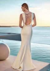 White evening dress with lace on the back