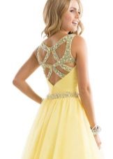 Open back in a yellow evening dress