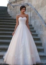 Wedding dress from the Crystal Design 2015 collection with a rose skirt