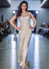 An evening dress from Oksana flies to the floor