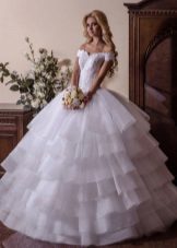 A magnificent wedding dress with a multi-tiered skirt