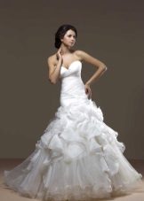 A wedding dress with a full skirt from the collection of Gold from Hadassah