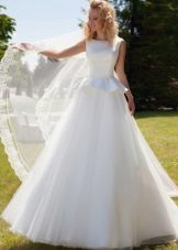 Wedding dress with peplum from Oksana Mukha