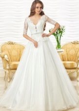 Lace wedding dress from Oksana Mukha with a peplum
