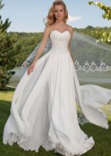 A magnificent wedding dress tiered from Oksana Mukha
