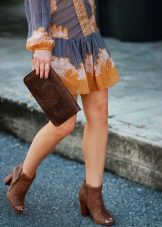 Brown ankle boots with a mustard dress