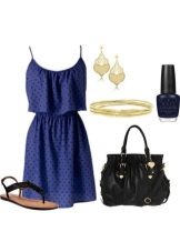 Navy dress in small black polka dots and matching accessories