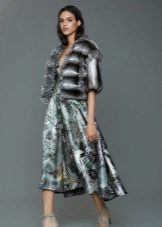 Fur vest under the midi evening dress