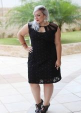 Fashionable black dress for a short woman