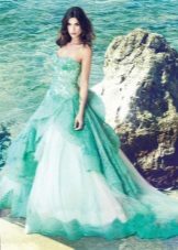 A mini dress in aquamarine color combined with white lace accents