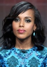 Makeup in navy blue under a dress of the color of a sea wave