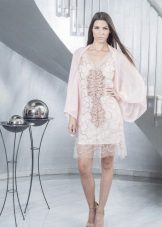 Short white lace dress with sleeves