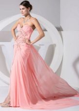 Peach dress with rhinestones and a train