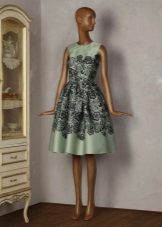 Dress Tatyana in green satin with sewn lace