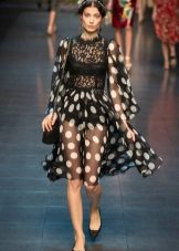 Black dress in large white polka dots