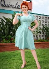 Blue dress in medium length with white polka dots