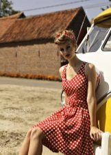 Red dress with white polka dots in retro style.