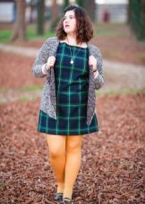 A green plaid dress for overweight women combined with yellow tights
