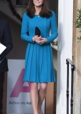 Blue dress with a pleated skirt of medium length