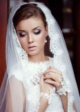 Wedding hairstyle in combination with a veil to a dress