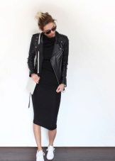 Sneakers under a knitted dress