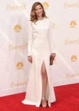 White long dress with a slit on a corporate party