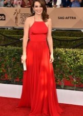 Long red dress with straps and a skirt