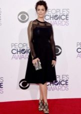 Black dress with a sun skirt and lace sleeves