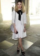 White low-waist dress with a full skirt