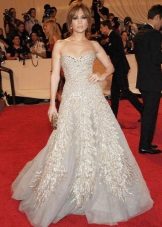 A 60s-style evening gown decorated with natural stones