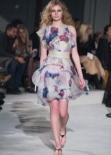 The fitted dress is summer color