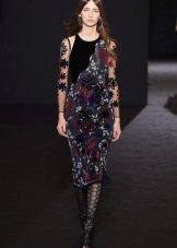 Fitted dress with a transparent sleeve