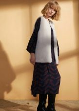 vest under a winter dress