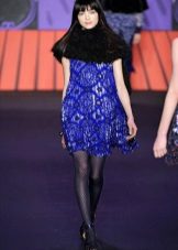 Black fishnet pantyhose to a blue dress