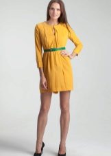 Green belt to a yellow dress