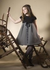 Knitted festive fluffy dress for a girl