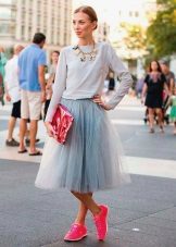 Layered skirt with sneakers