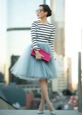 A layered skirt combined with a striped top