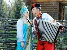 Wedding dress in Russian folk style with blue elements.