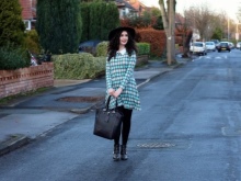 Mid-length long-sleeved dress in light green plaid (tartan) with a white collar